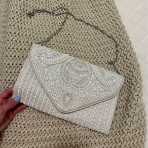 Lulu's White Textured Clutch Wristlet